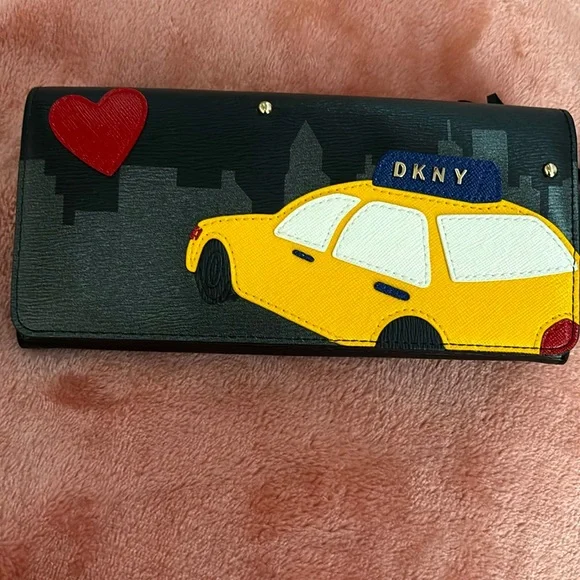 Beautiful DKNY NWT Bobi Taxi carryall wallet black with taxi cab & heart design. - Picture 1 of 5